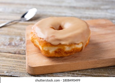 A view of a maple glaze donut.