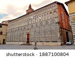 view of the marble side of the church of San Giovanni Fuorcivitas
in the historic center of the city of Pistoia in Tuscany, Italy