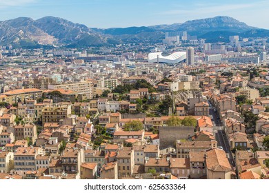 View Of Marseille From Notre-Dame De La Garde With The Stade Vélodrome In The Background

