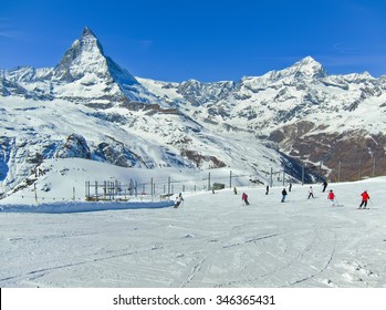 View Of Matterhorn With Some Skiers Skiing From Gornergrat, Zermatt, Switzerland