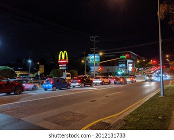 View Of McDonald's Drive Through Signboard And Traffic In Indooroopilly, Queensland Australia On 22 July 2021