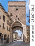 View of medieval gate Molino tower still functioning as a thoroughfare in Padova Italy