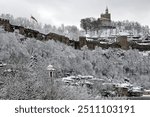 View of the medieval Tsarevets fortress in Veliko Tarnovo, Bulgaria, in the winter on a gloomy day