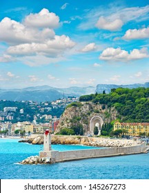 View Of Mediterranean Sea Resort, City Of Nice, Cote D'Azur, France, Provence, French Riviera. Front Of Harbor With Lighthouse