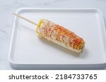 A view of Mexican corn on the cob, also known as elote.