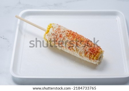 A view of Mexican corn on the cob, also known as elote.