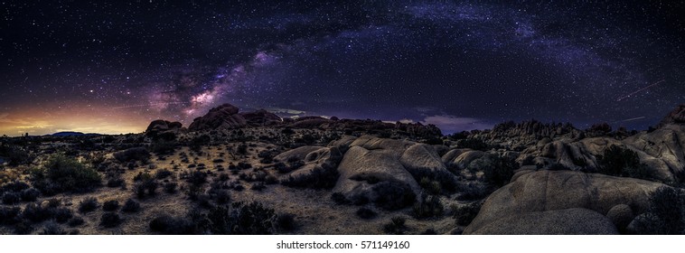 View of the Milky Way Galaxy at the Joshua Tree National Park.  The image is an hdr of astro photography photographed at night.  It depicts science and the divine heaven.