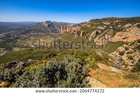 View from Mirador de los buitres on steep clifffs of Penas de Riglos near Huesca, Aragon, Spanish Pyrenees, Spain