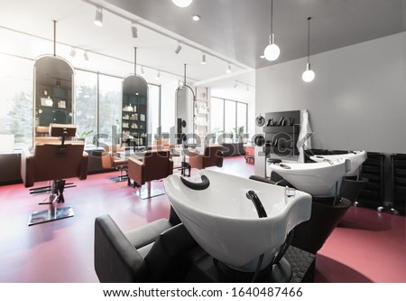 View of a modern bright beauty salon. Hair salon and make up store, modern light interior