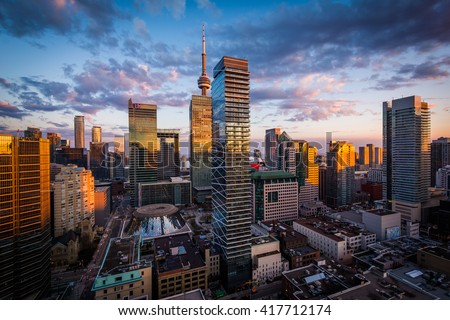 View of modern buildings at sunset in downtown Toronto, Ontario.