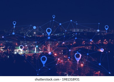 View of modern city with location pointers at night - Powered by Shutterstock - Get 15% off with code: PIKWIZARD15