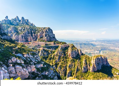 View of the Monastery of Montserrat in Catalonia, near Barcelona. Panorama from the top of the mountain. - Powered by Shutterstock