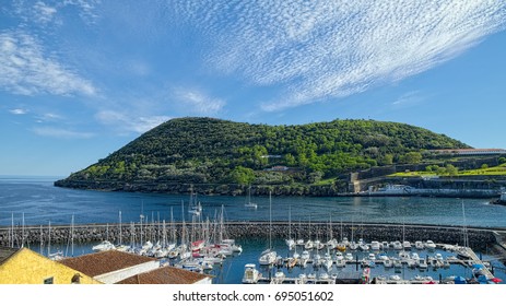 A View To Monte Brasil Mountain And Marina On Foreground With Many Small Yachts, In Angra Do Heroismo City, Located On Azorean Island Of Terceira, Portugal. 