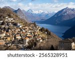 View from Monte Bre of the village, Lake Lugano, and surrounding mountains, Switzerland