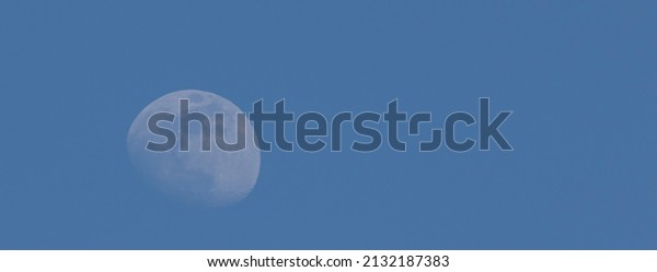 A view of the moon in\
daytime 
