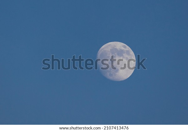 view of the moon during the day . The Moon is\
Earth\'s only natural\
satellite.