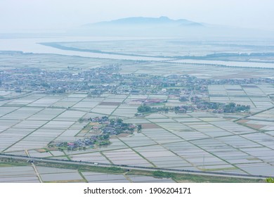 View From Moriyama Toward Hachirogata In Spring Haze