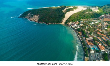 View of Morro do Careca, this is a dune of approximately 107 meters located at the southern end of Ponta Negra Beach, in Natal, Rio Grande do Norte. It is one of the main tourist symbols of the city. - Shutterstock ID 2099014060