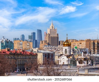 View Of Moscow Cityscape, Old Historical Town And Urban Skyscrapers (Moscow International Business Center Background) With Sunny Blue Sky, Moscow City, Russia