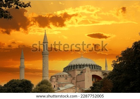 A view of a mosque with a cloudy sky in the background. hagai sophia istanbul turkey