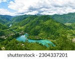 View of Most na Soči lake and the hills above in Primorska, Slovenia in summer