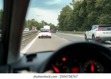 View of the motorway from inside the car while driving along the road.