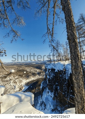 view from Mount Aigir in Bashkiria in winter on a sunny frosty day, Beloretsk