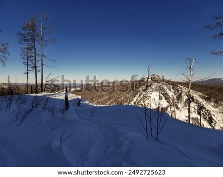 view from Mount Aigir in Bashkiria in winter on a sunny frosty day, Beloretsk