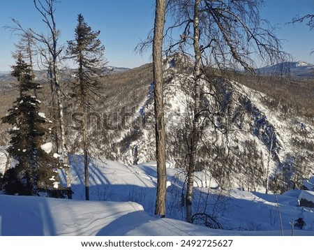 view from Mount Aigir in Bashkiria in winter on a sunny frosty day, Beloretsk