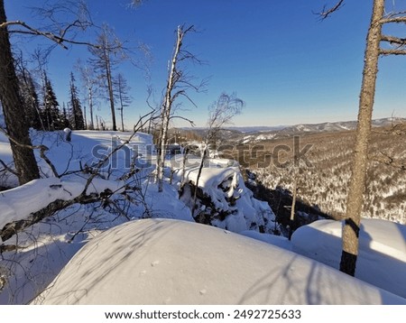 view from Mount Aigir in Bashkiria in winter on a sunny frosty day, Beloretsk