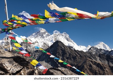 view of Mount Everest, Mt Lhotse and Makalu peak with buddhist prayer flags from Gokyo Ri peak, Khumbu valley,  Nepal Himalayas mountains