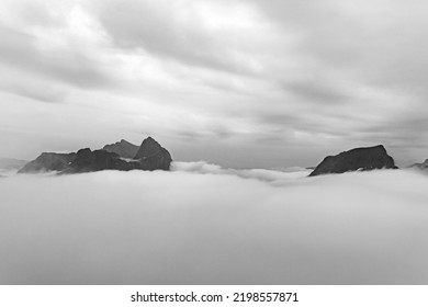 View from Mount Hesten in fog from Hesten trail to the Segla mountain on Senja island in northern Norway.