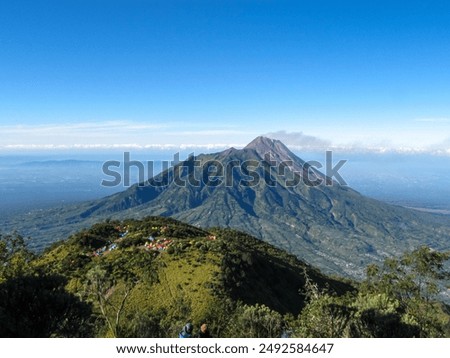 view of Mount Merapi from the top of Mount Merbabu, Central Java, Indonesia