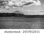 A view of Mount Rainie with the Puget Sound in the foreground. Loaction is Burien, Washington.