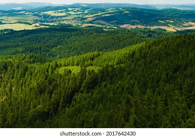 View From Mountain In Central Sudetes. Landscape With Fields And Blue Sky