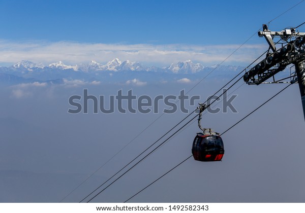 View of mountain range from the\
cable car station located on the top of the hill in\
Kathmandu.