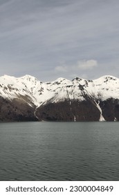 view of mountain range covered by snow