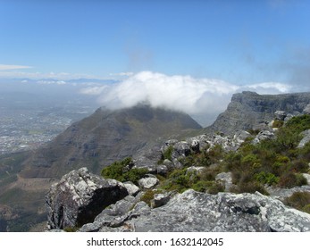 View to mountain  top covered with a cloud  