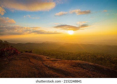 View of mountains and cliffs in the evening,Cliffs and mountains,Empty standing on top of mountain view, empty cliff edge with mountains on clouds, turquoise sky - Powered by Shutterstock