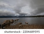 View of the mountains from milarrochy bay on Loch Lomond, Scotland, UK with low cloud