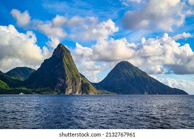 A view of the mountains from Petit Piton on St. Lucia in the Caribbean under blue skies - Shutterstock ID 2132767961