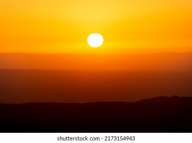 View Of Mountains Ridges Layers With White Sun At Sunset Time In The Sierras De Cordoba,Argentina