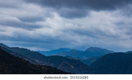 View of mountains and vast valleys with clouds and blue skys.