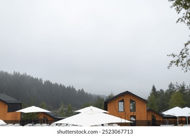 view of the mountains and a wooden house - Powered by Shutterstock