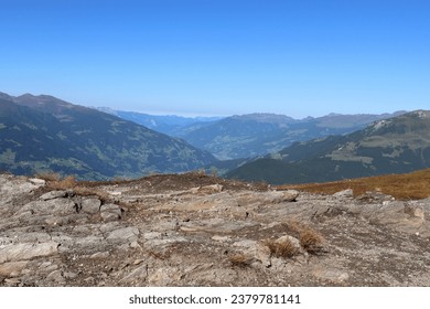 view of the mountains of the Zillertal and rocky ground in the foreground - Powered by Shutterstock