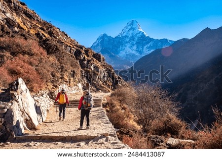 View of Mt. Ama Dablam, captured during Everest Base Camp trekking, Nepal. The non-English text means 