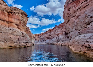 View of narrow, cliff-lined canyon from a boat in Glen Canyon National Recreation Area, Lake Powell, Arizona - Shutterstock ID 1775362667