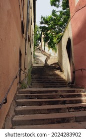 View of a narrow street in old Lyon city and its antique stairs leading up the hill, a popular tourist attraction and possibility for physical activity, walk and exercise in daily lifestyle.