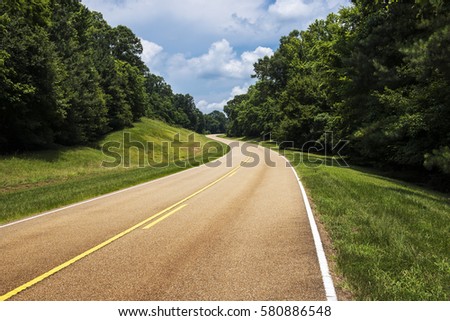 View of the Natchez Trace Parkway in Mississippi; Concept for travel in America and road trip in America
