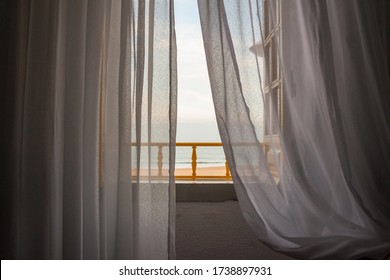 View of Nazare beach from the window of a house on the promenade, Leiria, Portugal